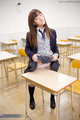 Standing in classroom masturbating pussy on corner of desk