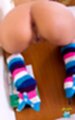 On all fours ass raised naked in striped socks