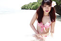 Miyu H stripping striped bikini on a day out at the beach