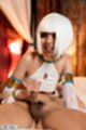 Looking up smiling giving handjob