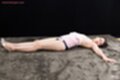 Sawamoto yukie on her back stretched out wearing high heels